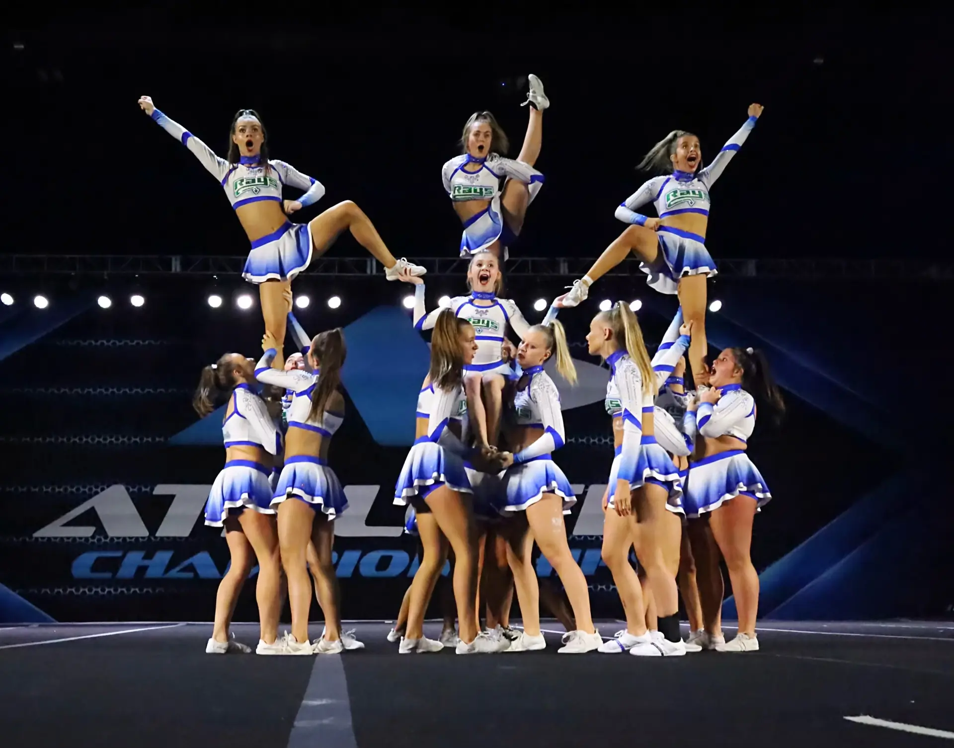 Stingrays Cartersville cheerleaders performing a competitive routine.