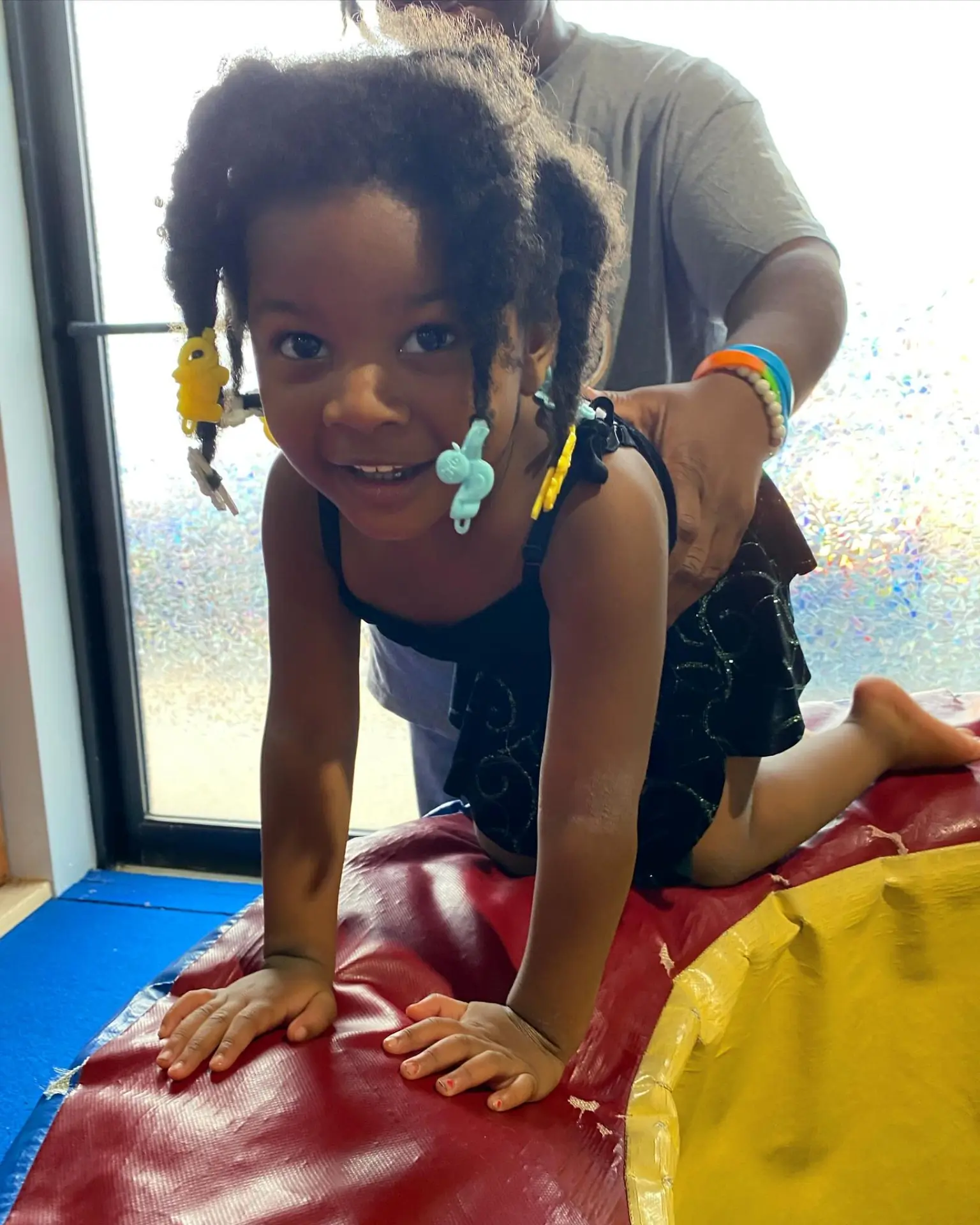 Young Girl balancing on a mat.